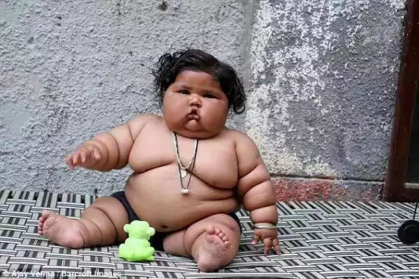 OMG !! See The 8-Month-Old Indian Girl That Weighs 10lbs, Craves For Food & Eats Like An Adult (Photo )